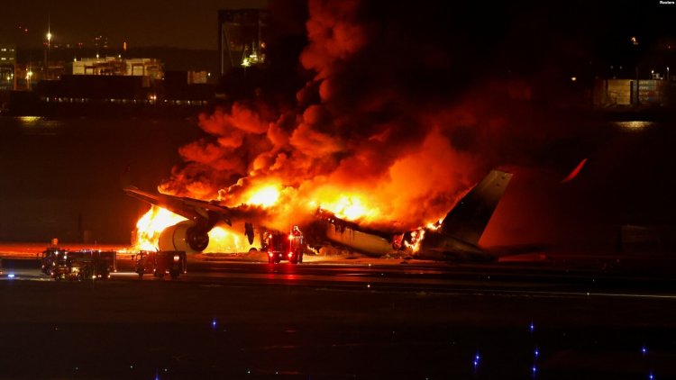 Japonya'da bir yolcu uçağında Tokyo'ya inerken yangın çıktı: İki uçağın çarpıştığı bildiriliyor